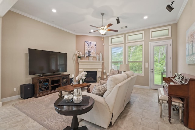 514 Pearl View Ln, Pinehurst, TX 77362 - living area featuring a ceiling fan, crown molding, baseboards, a glass covered fireplace, and recessed lighting