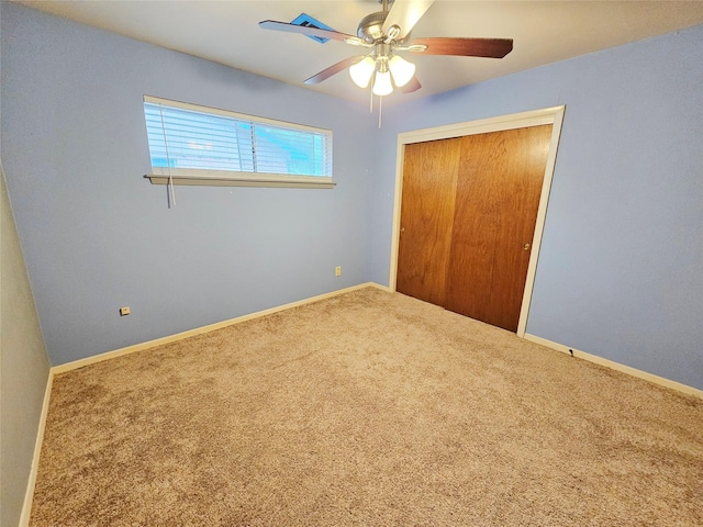807 Golf Ct, Stafford, TX 77477 - unfurnished bedroom featuring carpet floors, a closet, ceiling fan, and baseboards