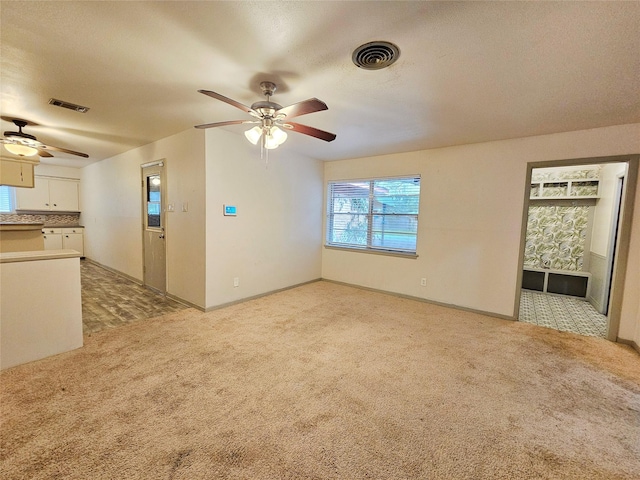 807 Golf Ct, Stafford, TX 77477 - unfurnished room with ceiling fan, light colored carpet, and baseboards