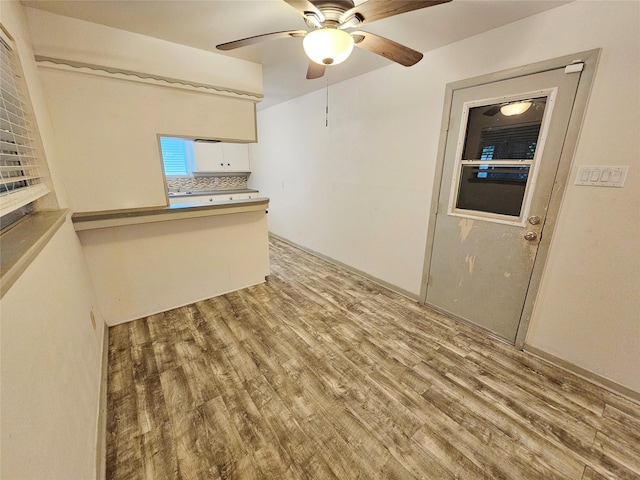 807 Golf Ct, Stafford, TX 77477 - unfurnished room with light wood-type flooring and ceiling fan