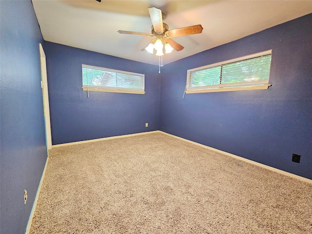 807 Golf Ct, Stafford, TX 77477 - unfurnished room with healthy amount of natural light, ceiling fan, carpet flooring, and baseboards