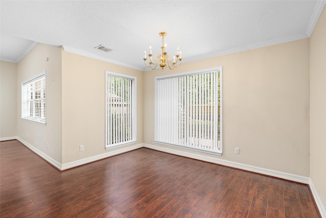 65 Hickory Oak Dr, The Woodlands, TX 77381 - unfurnished dining area featuring a chandelier, wood finished floors, baseboards, plenty of natural light, and ornamental molding