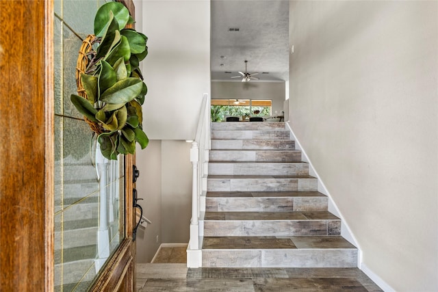 170 April Cv, Montgomery, TX 77356 - staircase featuring a ceiling fan and baseboards