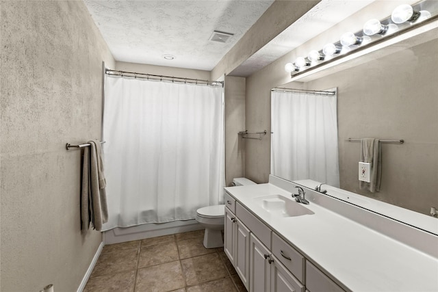170 April Cv, Montgomery, TX 77356 - bathroom with vanity, toilet, a textured ceiling, and shower / bathtub combination with curtain