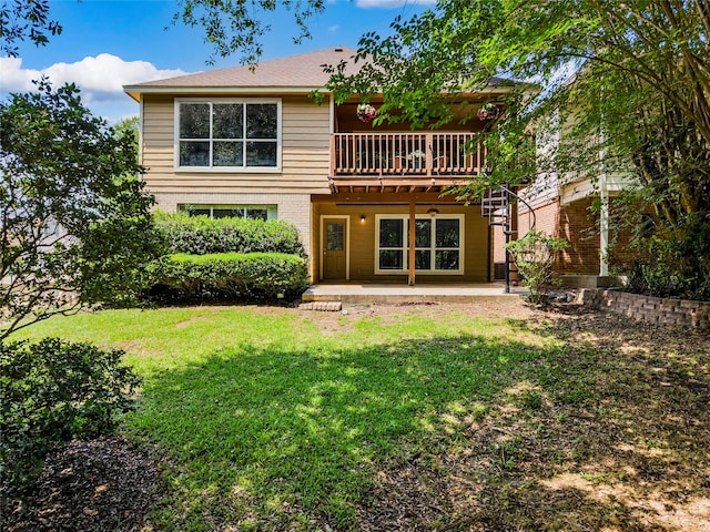 170 April Cv, Montgomery, TX 77356 - rear view of property with a yard, a patio, and brick siding