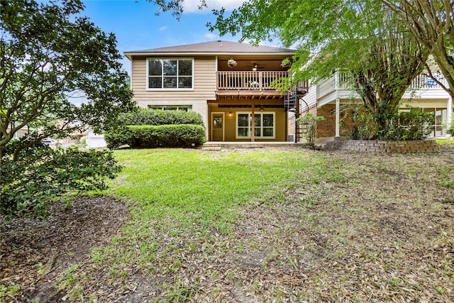 170 April Cv, Montgomery, TX 77356 - rear view of property featuring a yard, ceiling fan, and brick siding