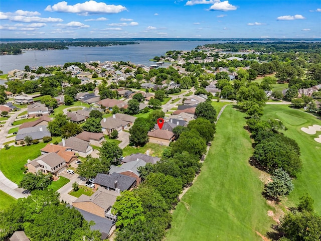 170 April Cv, Montgomery, TX 77356 - aerial perspective of suburban area featuring a nearby body of water and a golf course