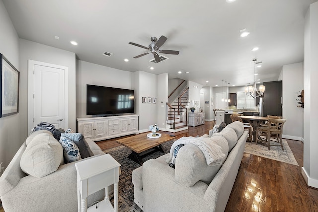 living room with stairs, dark wood-style floors, a ceiling fan, baseboards, and recessed lighting