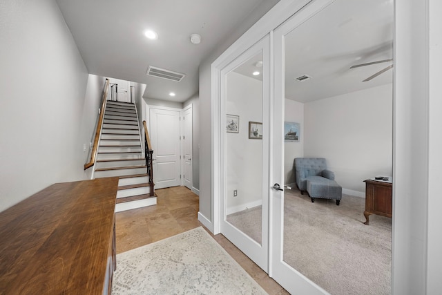 hall featuring french doors, stairway, recessed lighting, and baseboards