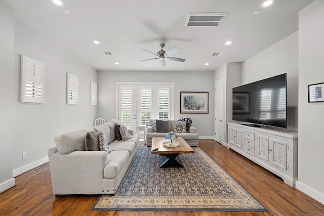 living room with baseboards, ceiling fan, recessed lighting, and wood finished floors