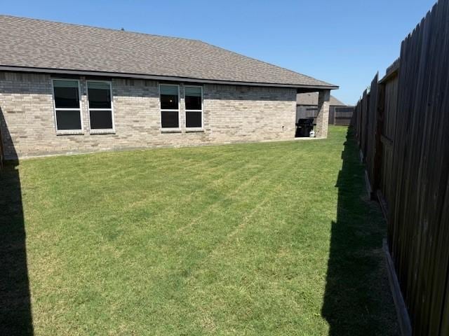 18714 Sweetwater Springs Dr, Cypress, TX 77433 - rear view of property featuring brick siding and a shingled roof