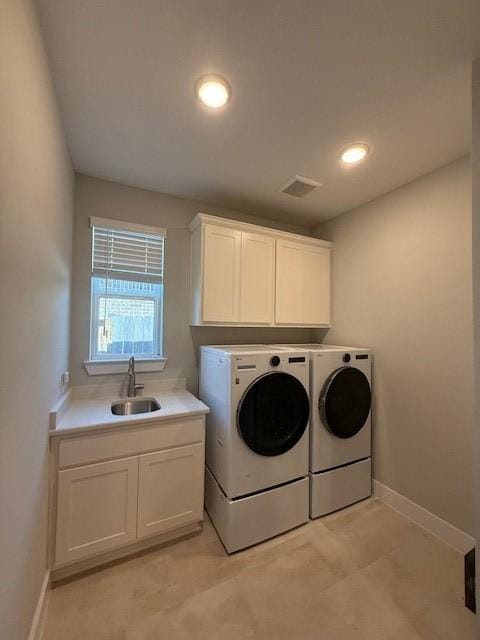 18714 Sweetwater Springs Dr, Cypress, TX 77433 - laundry area featuring separate washer and dryer, cabinet space, baseboards, and recessed lighting