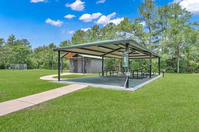 view of community with a gazebo and a yard
