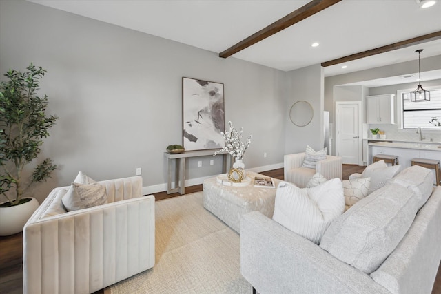 3104 Eunice St, Houston, TX 77009 - living area featuring recessed lighting, beamed ceiling, baseboards, and light wood-style floors