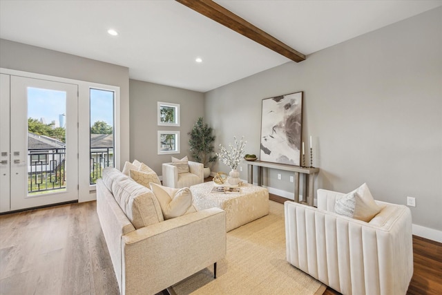 3104 Eunice St, Houston, TX 77009 - living area featuring wood finished floors, recessed lighting, baseboards, and beam ceiling