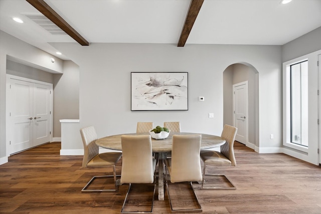 3104 Eunice St, Houston, TX 77009 - dining area with recessed lighting, baseboards, arched walkways, beam ceiling, and wood finished floors