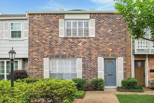 12709 Huntingwick Dr Unit 167, Houston, TX 77024 - view of front of property with brick siding