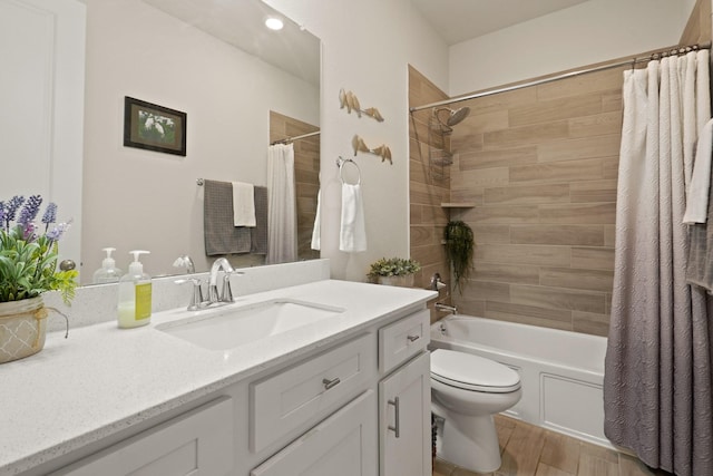23440 Yaupon Hills Dr, New Caney, TX 77357 - bathroom featuring shower / bath combination with curtain, vanity, toilet, and wood finished floors