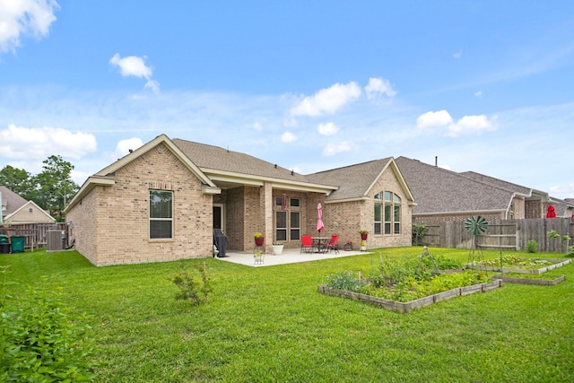 23440 Yaupon Hills Dr, New Caney, TX 77357 - rear view of property featuring brick siding, a patio, a vegetable garden, cooling unit, and a shingled roof