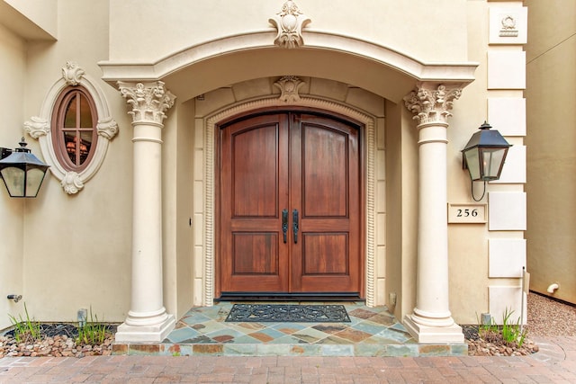256 S Post Oak Ln, Houston, TX 77056 - entrance to property with stucco siding