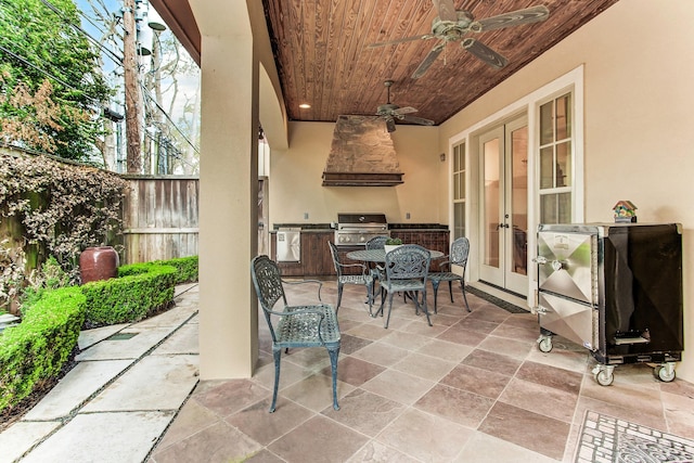 256 S Post Oak Ln, Houston, TX 77056 - view of patio featuring french doors, area for grilling, fence, a ceiling fan, and a grill