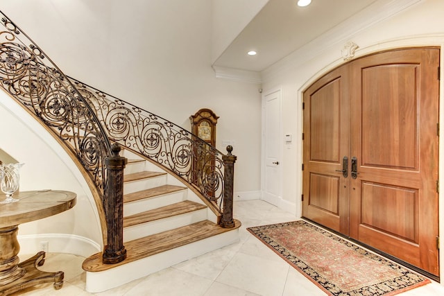 256 S Post Oak Ln, Houston, TX 77056 - foyer featuring recessed lighting, ornamental molding, and stairs