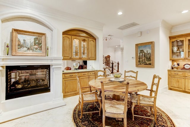 256 S Post Oak Ln, Houston, TX 77056 - dining area featuring crown molding, recessed lighting, light tile patterned floors, and baseboards