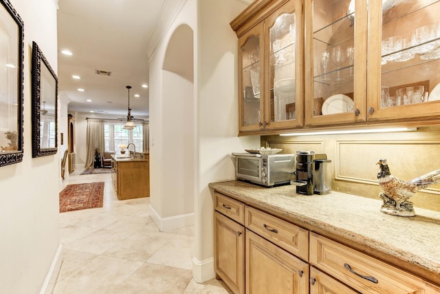 256 S Post Oak Ln, Houston, TX 77056 - bar with baseboards, recessed lighting, arched walkways, a sink, and light tile patterned floors
