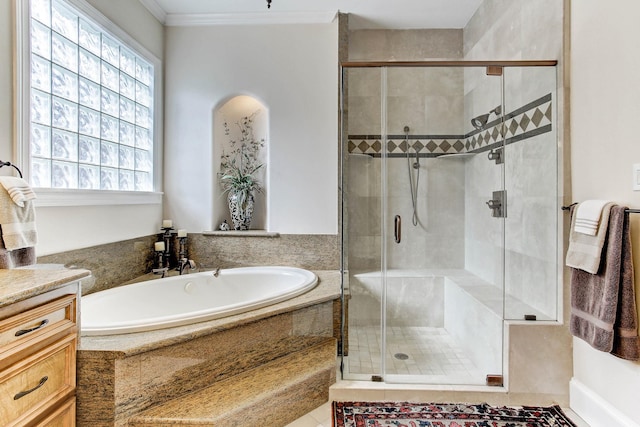 256 S Post Oak Ln, Houston, TX 77056 - full bath featuring ornamental molding, a shower stall, a bath, and vanity
