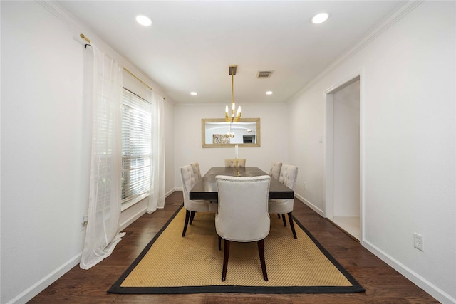 dining space featuring crown molding, baseboards, recessed lighting, and wood finished floors