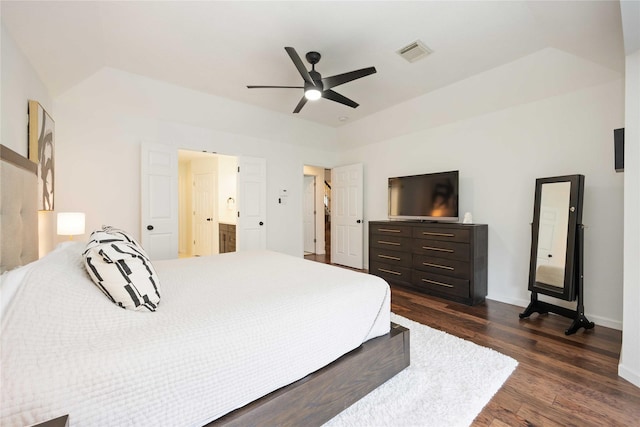 bedroom featuring dark wood-type flooring, baseboards, and ceiling fan