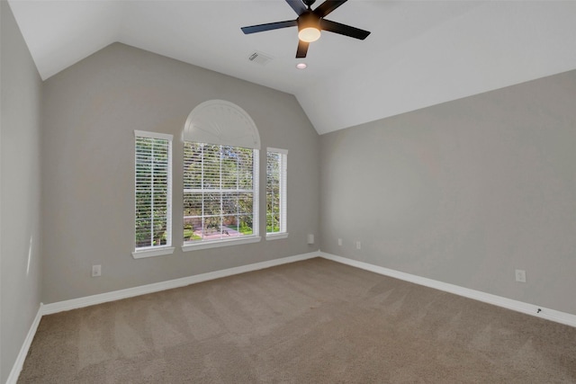 9619 Silver Birch Ct, Missouri City, TX 77459 - carpeted spare room with vaulted ceiling, a ceiling fan, and baseboards