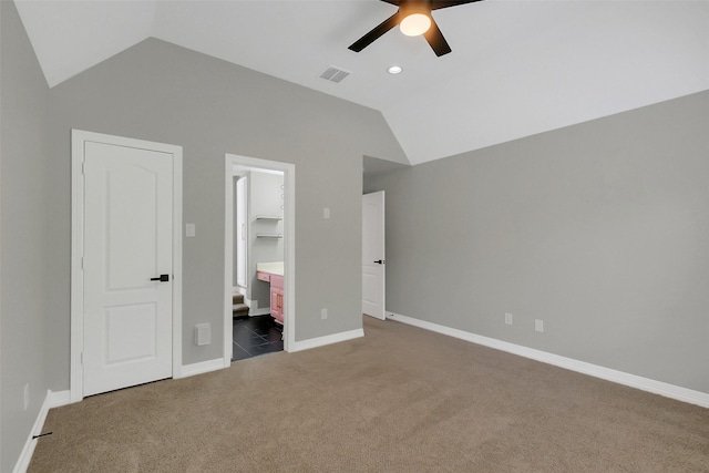 9619 Silver Birch Ct, Missouri City, TX 77459 - unfurnished bedroom with lofted ceiling, dark colored carpet, baseboards, ensuite bath, and a ceiling fan