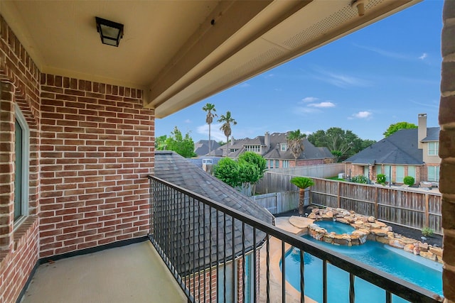 9619 Silver Birch Ct, Missouri City, TX 77459 - balcony featuring a residential view and a pool with connected hot tub
