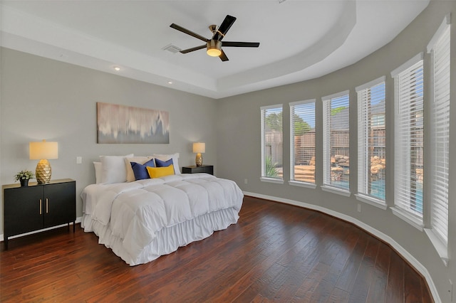 9619 Silver Birch Ct, Missouri City, TX 77459 - bedroom featuring a raised ceiling, hardwood / wood-style flooring, baseboards, recessed lighting, and ceiling fan