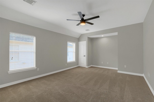 9619 Silver Birch Ct, Missouri City, TX 77459 - empty room with carpet floors, ceiling fan, baseboards, and lofted ceiling