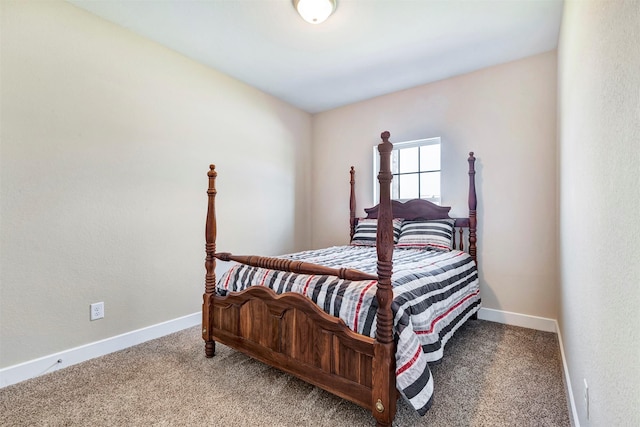 426 Pebble Dr, Dayton, TX 77535 - bedroom featuring carpet floors and baseboards