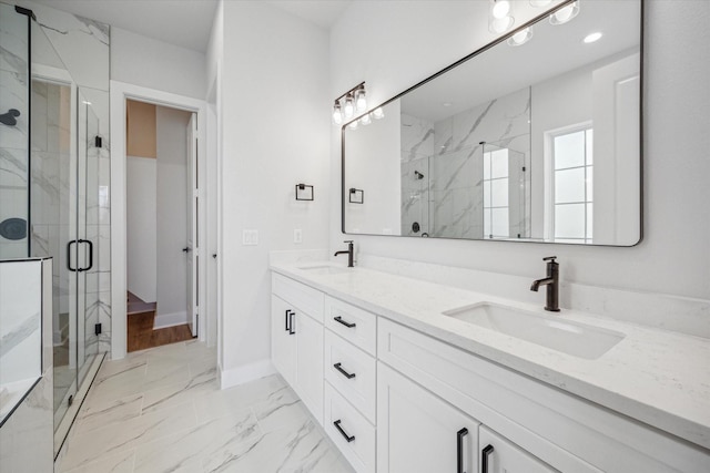 1037 17th St, Houston, TX 77008 - bathroom featuring a marble finish shower, marble look tile flooring, double vanity, recessed lighting, and baseboards