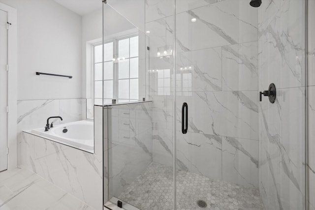 1037 17th St, Houston, TX 77008 - full bath with a bath and a marble finish shower