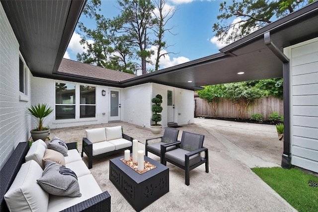 1122 Lehman St, Houston, TX 77018 - view of patio / terrace with an outdoor living space with a fire pit and fence