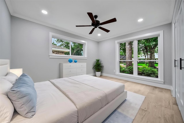 1122 Lehman St, Houston, TX 77018 - bedroom featuring ornamental molding, baseboards, light wood finished floors, recessed lighting, and ceiling fan