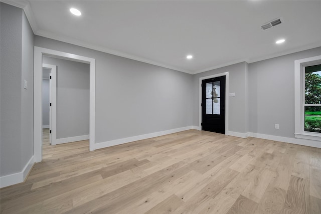 1122 Lehman St, Houston, TX 77018 - foyer featuring crown molding, light wood finished floors, recessed lighting, and baseboards