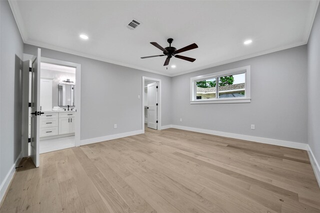 1122 Lehman St, Houston, TX 77018 - unfurnished bedroom featuring ornamental molding, baseboards, light wood-style floors, connected bathroom, and recessed lighting
