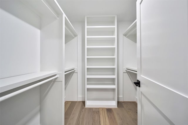 1122 Lehman St, Houston, TX 77018 - spacious closet featuring light wood-style flooring