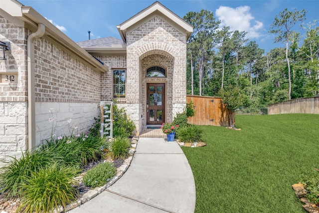 342 Topper Pines Dr, Montgomery, TX 77316 - view of exterior entry featuring brick siding and french doors