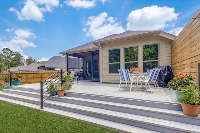342 Topper Pines Dr, Montgomery, TX 77316 - deck featuring a sunroom, fence, ceiling fan, and outdoor dining area