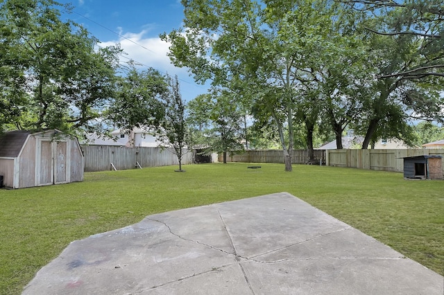 4126 Fitzwater Dr, Spring, TX 77373 - view of yard with a storage shed, a patio area, and an outdoor structure