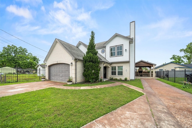 view of front of property with driveway, a chimney, and an attached garage