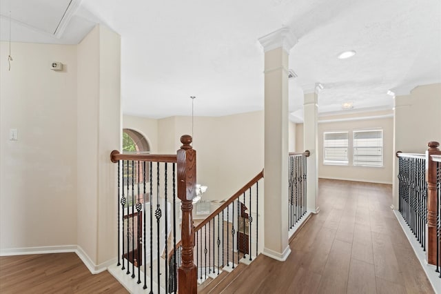 26414 Creston Woods Dr, Katy, TX 77494 - corridor featuring an upstairs landing, attic access, wood finished floors, and baseboards