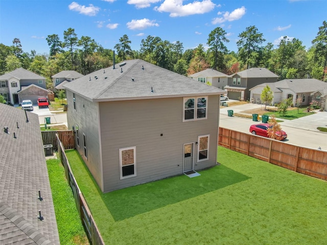 109 Chestnut Gate Dr, Conroe, TX 77378 - rear view of property with a shingled roof, a residential view, and central AC unit